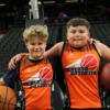 A picture of Unlocked Potential Flag Elite youth basketball league teammates at the Phoenix Suns mortgage matchup arena.