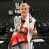 A picture of Unlocked Potential Flag Elite youth basketball league championship MVP at the Phoenix Suns mortgage matchup arena.