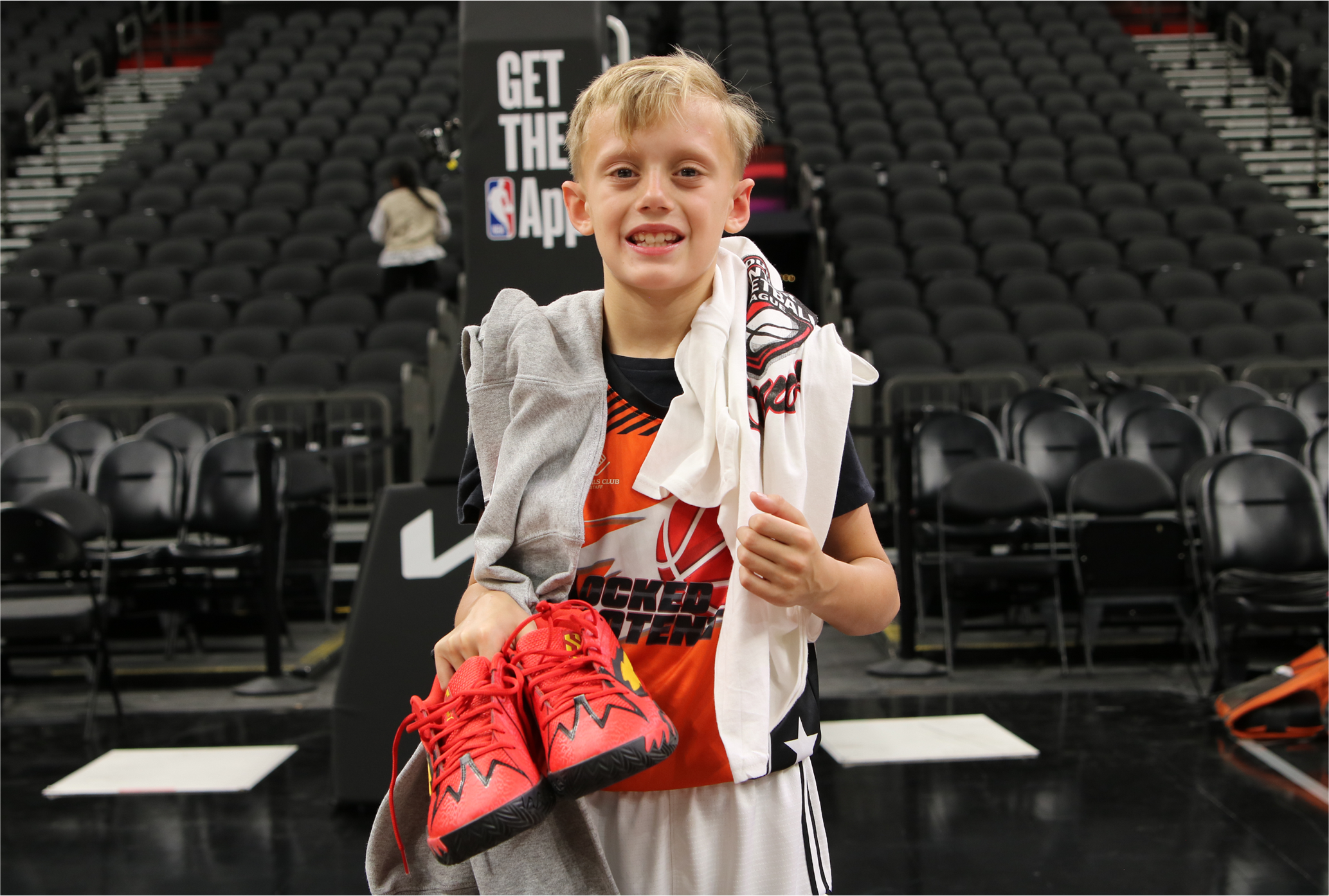 A picture of Unlocked Potential Flag Elite youth basketball league championship MVP at the Phoenix Suns mortgage matchup arena.