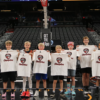 A picture of Unlocked Potential Flag Elite youth basketball league champions at the Phoenix Suns mortgage matchup arena.