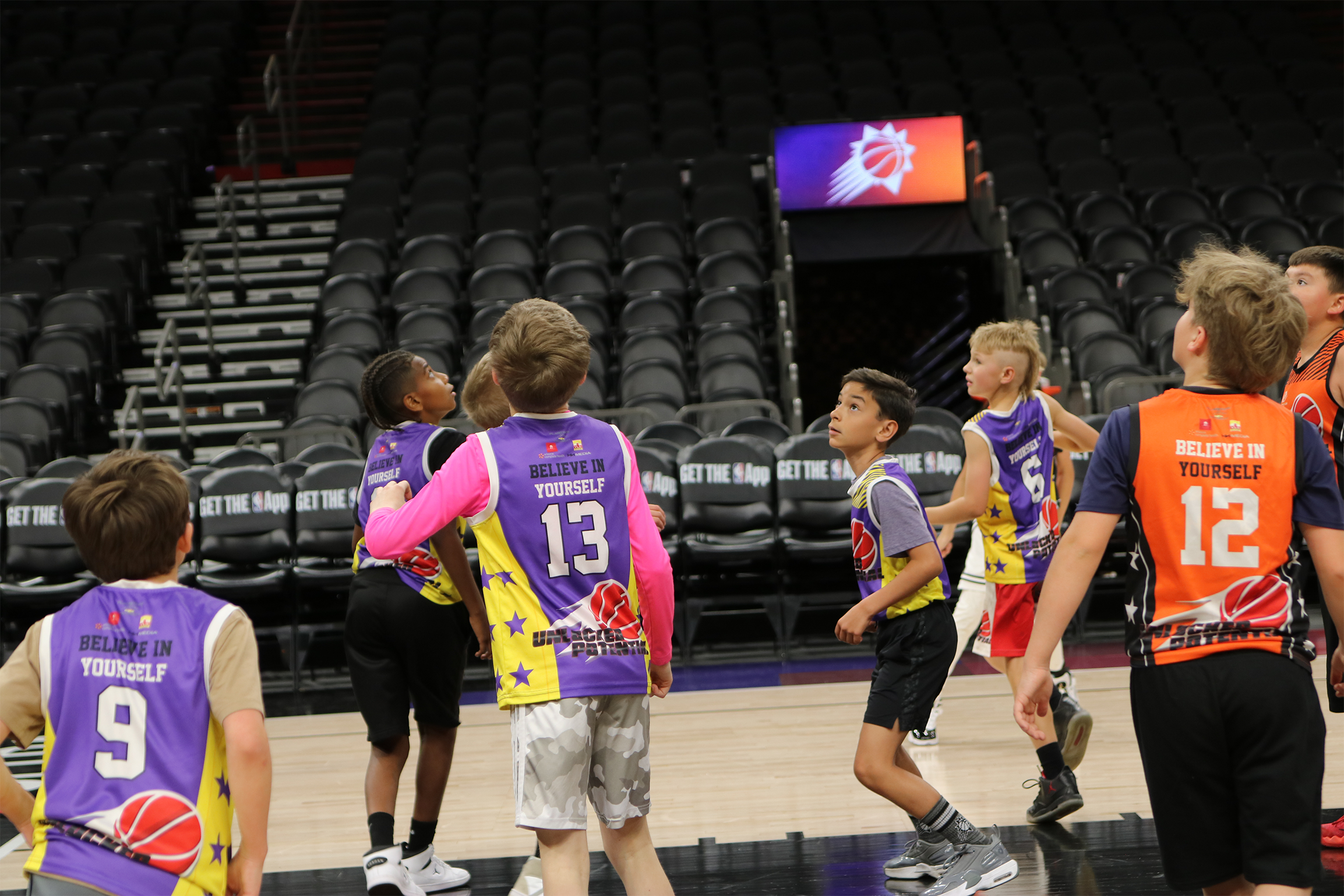 A picture of kids preparing for a rebound playing at the Unlocked Potential winter league championship.