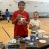 A pair of kids attending the 2025 fall youth break camp in Flagstaff, AZ