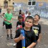 A group of kids playing with water guns at the fall break youth camp in Flagstaff, AZ.