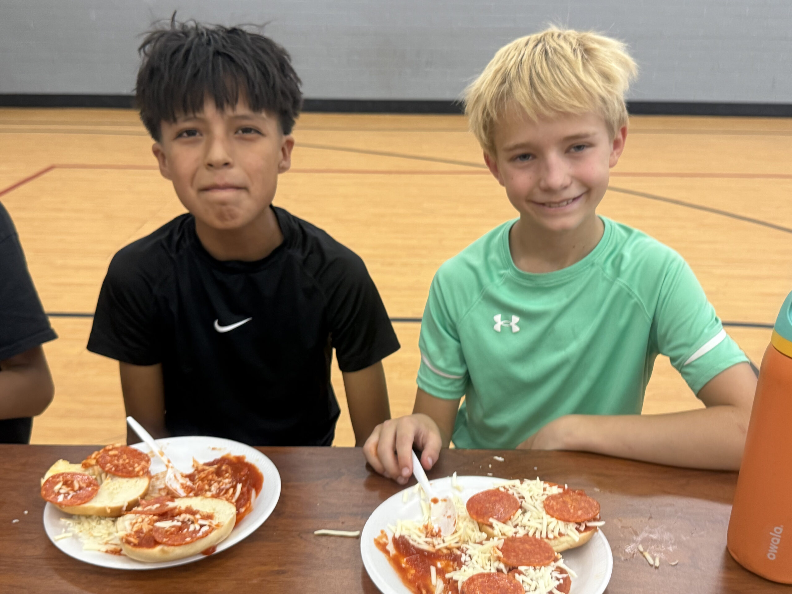 Two children attending the Unlocked Potential winter break youth camp.