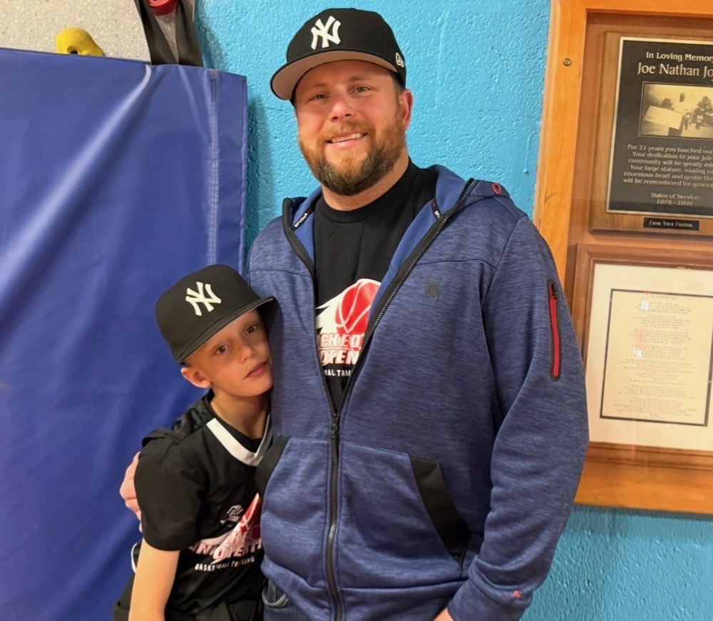 A picture of a parent and a child at the Unlocked Potential Winter Break Youth Camp in Flagstaff, AZ